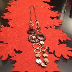 A beautiful Chico’s neckless in brow and hold!